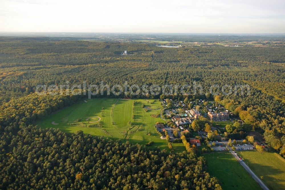 Datteln from the bird's eye view: Hotel complex with golf course of Schnieder e.K. in a wooded area in Datteln in North Rhine-Westphalia