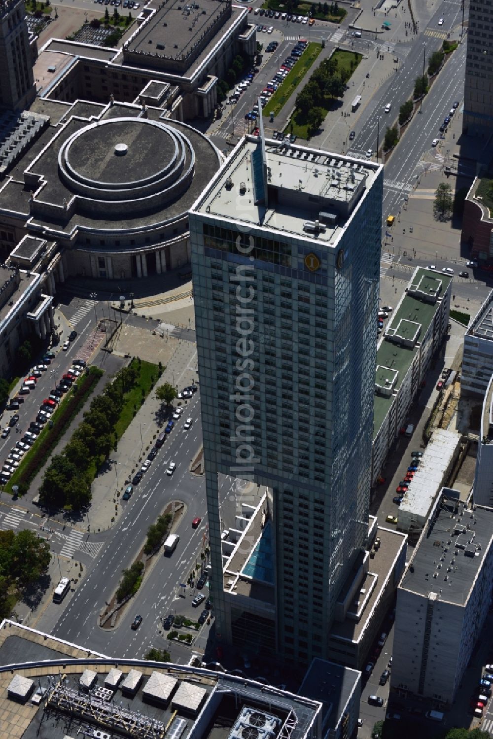 Aerial image Warschau - Hotel InterContinental in downtown Warsaw in Poland. The five-star-hotel is a landmark of the city and the third-largest hotel in Europe. It was built under the construction company Porr AG from 2001 until 2003. It is 164 m high and covers 45 floors. Its most distinct feature is the gap in its lower floors which was constructed to guarantee sunlight for the smaller buildings behind it