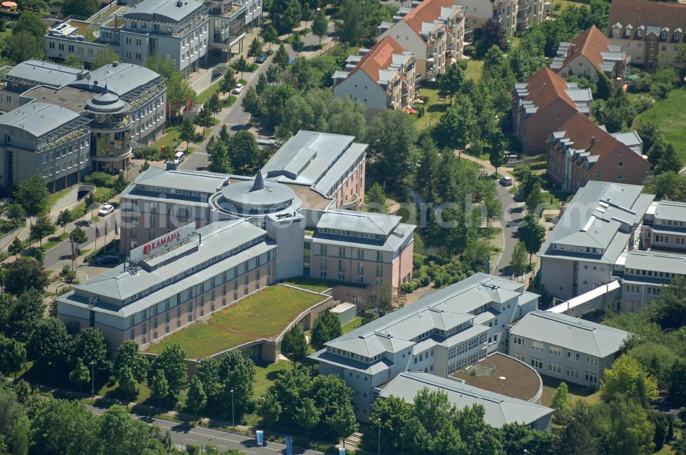 Magdeburg from the bird's eye view: Blick auf das Ramada Hotel in Magdeburg. Das 4- Sterne- Hotel gehört zur RAMADA Worldwide- Kette. Das Hotel verfügt über 243 Hotelzimmer und Suiten. Das Hotel besitzt einen Fitness- und Wellnessbereich. View of the Ramada Hotel in Magdeburg. The four star hotel is part of the Ramada Worldwide chain. The hotel has 243 rooms and suites. The hotel has a fitness and wellness area.