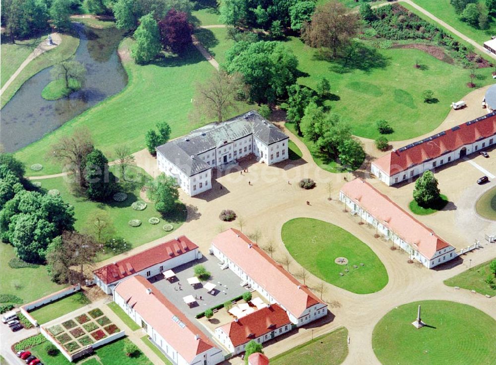 Aerial image Neuhardenberg (ehem. Marxwalde) / Brandenburg - Hotel Schloss Neuhardenberg Inmitten eines von Peter Joseph Lenné und Hermann Fürst von Pückler-Muskau gestalteten Landschaftparks gelegen, bietet Hotel Schloss Neuhardenberg Komfort und Ruhe. Es verfügt über Räumlichkeiten verschiedener Größe für Gespräche, Tagungen und Konferenzen, aber auch für Feierlichkeiten. Für die Planung und Gestaltung von Konferenzen, Tagungen und Gesprächen und des entsprechenden kulturellen und kulinarischen Begleitprogramms unterbreitet Ihnen der Veranstaltungsservice von Hotel Schloss Neuhardenberg unter der Telefonnummer +49 (0)30 - 889 290-15 gerne detaillierte Arrangementvorschläge. Einzelreservierungen werden unter der Telefonnummer +49 (0)30 - 889 290-0 entgegen genommen. Hotel Schloss Neuhardenberg wird in Zusammenarbeit mit den Althoff Hotels betrieben. Neuhardenberg 08.05.2001