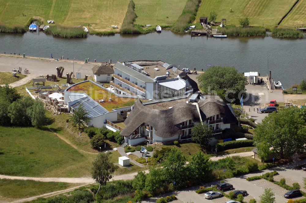 Aerial image Baabe - Blick auf das Hotel Solthus am See auf der Insel Rügen im Ostseebad Baabe. Im Hintergrund eigener Bootsanlegesteg in der Mündung / Verbindung der Having Bucht und dem Selliner See. Kontakt: Hotel Solthus Betriebsgesellschaft mbH, Bollwerkstrasse 1, 18586 Ostseebad Baabe / Rügen, Tel. +49(0)38303 8716-0, Fax +49(0)38303 8716-99, e-mail: info@solthus.de