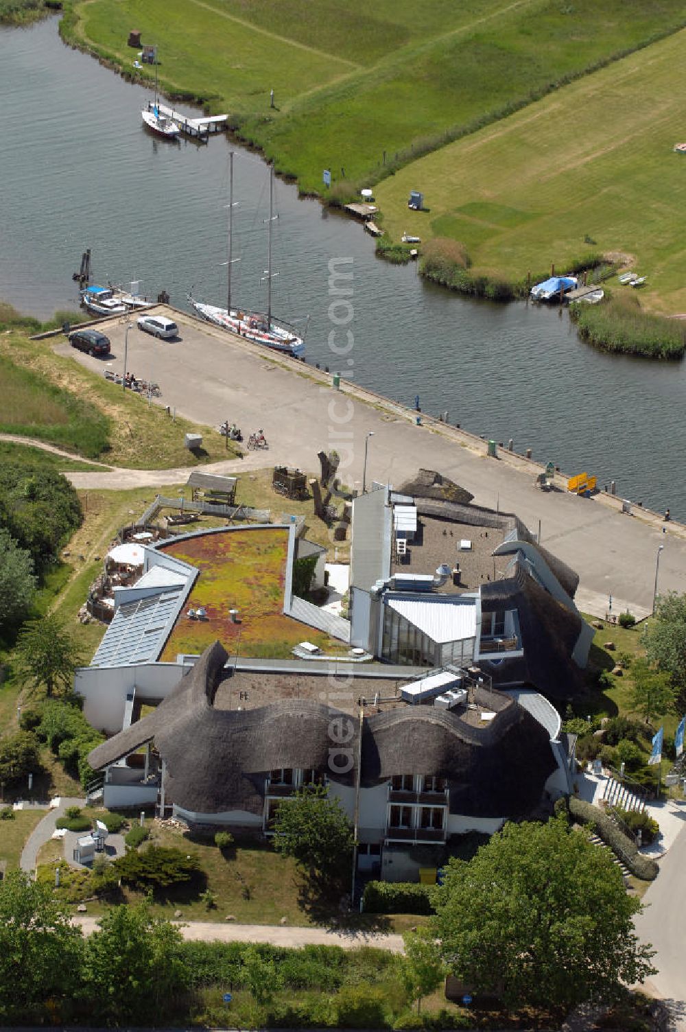 Aerial image Baabe - Blick auf das Hotel Solthus am See auf der Insel Rügen im Ostseebad Baabe. Im Hintergrund eigener Bootsanlegesteg in der Mündung / Verbindung der Having Bucht und dem Selliner See. Kontakt: Hotel Solthus Betriebsgesellschaft mbH, Bollwerkstrasse 1, 18586 Ostseebad Baabe / Rügen, Tel. +49(0)38303 8716-0, Fax +49(0)38303 8716-99, e-mail: info@solthus.de