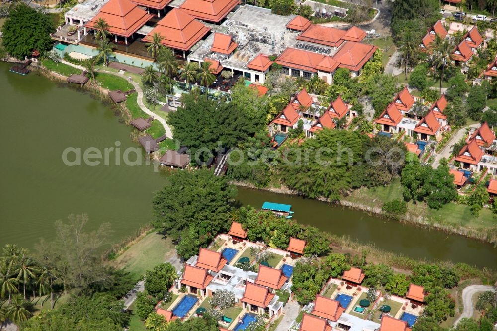 Aerial photograph Choeng Thale - Resort and golf course with cottages partially of typical architectural style of buildings in Choeng Thale on the island of Phuket in Thailand