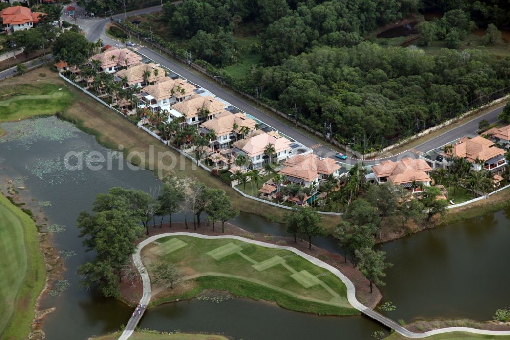 Aerial image Choeng Thale - Resort and golf course with cottages partially of typical architectural style of buildings in Choeng Thale on the island of Phuket in Thailand