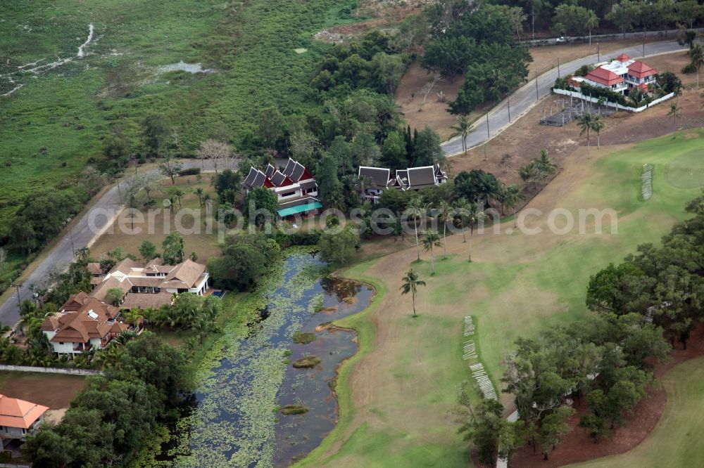 Aerial photograph Choeng Thale - Resort and golf course with cottages partially of typical architectural style of buildings in Choeng Thale on the island of Phuket in Thailand