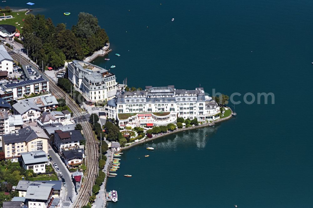 Zell am See from the bird's eye view: Complex of the hotel building GRAND HOTEL ZELL AM SEE on street Esplanade in Zell am See in the Alps in Salzburg, Austria