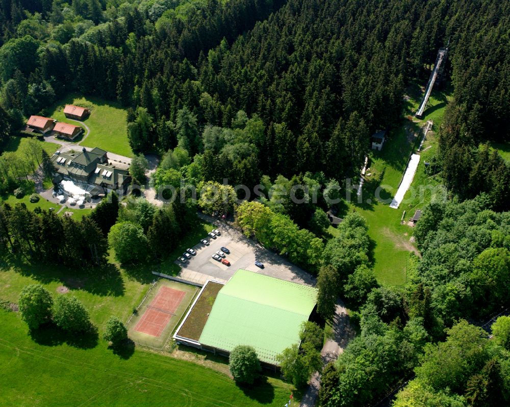 Benneckenstein from the bird's eye view: Complex of the hotel building Harzhaus on street Heringsbrunnen and sports facilities in Benneckenstein in the Harz in the state Saxony-Anhalt, Germany