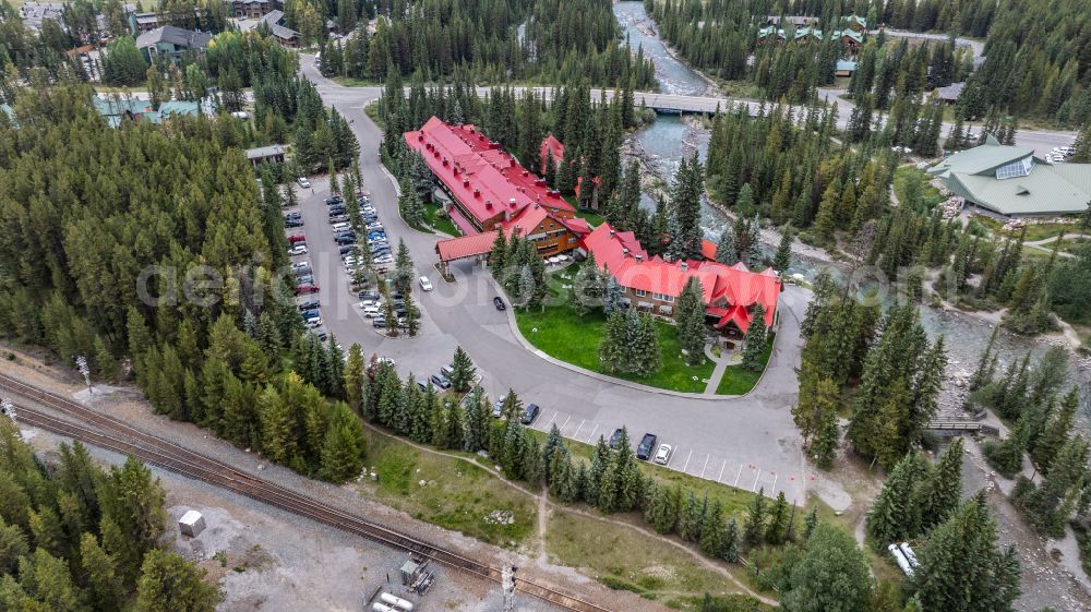 Aerial image Lake Louise - Complex of the hotel building Post Hotel & Spa in Canadian Rocky Mountains on street Pipestone Road in Lake Louise in Alberta, Canada