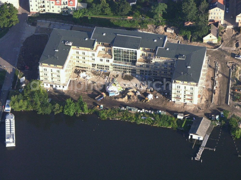 Neuruppin from the bird's eye view: Construction site of complex of the hotel building Resort Mark Brandenburg (formerly Fontane Plaza) in Neuruppin in the state Brandenburg, Germany