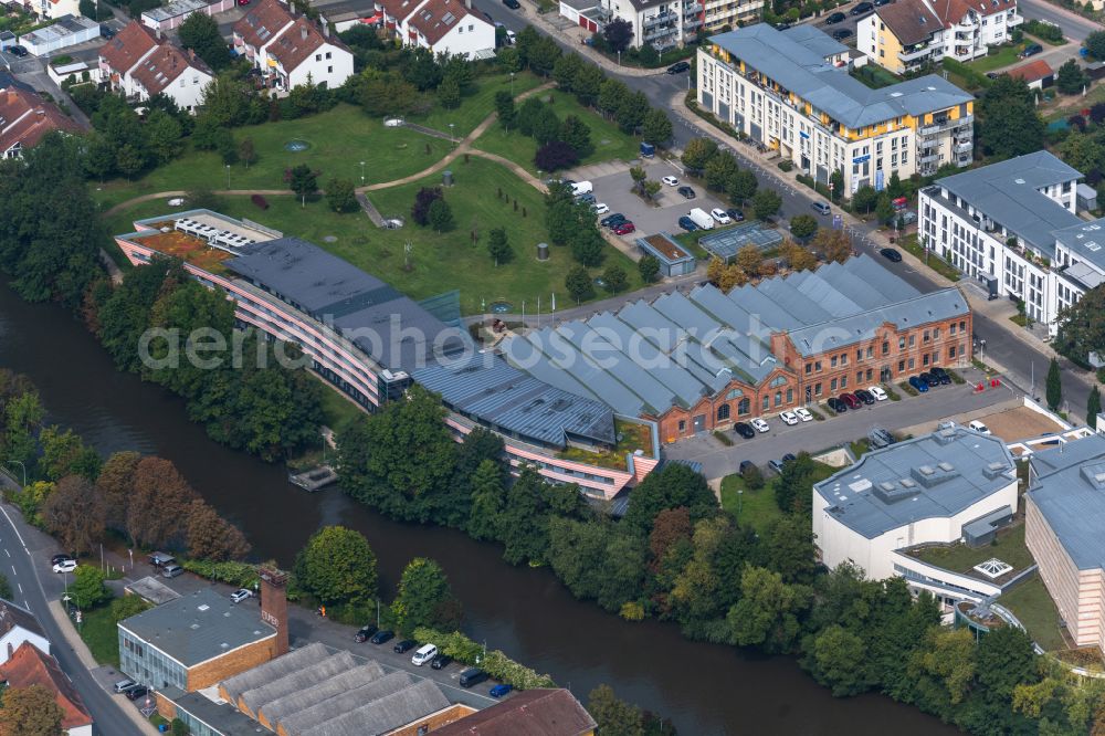 Bamberg from the bird's eye view: Complex of the hotel building of Welcome Kongresshotel Bamberg am Ufer des Linken Regnitzarm in Bamberg in the state Bavaria, Germany