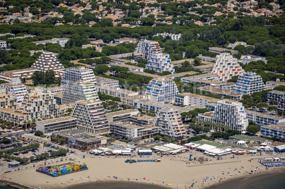 Aerial image La Grande-Motte - Hotel landscape and tourist developments on the Mediterranean beach in La Grande-Motte in the province of Languedoc-Roussillon in France