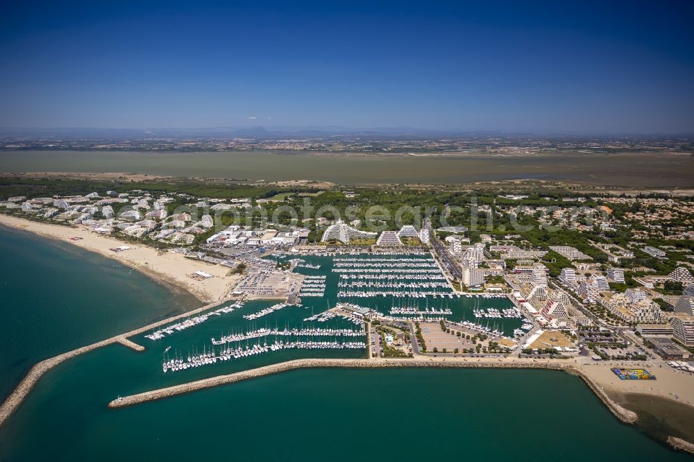 La Grande-Motte from the bird's eye view: Hotel landscape and tourist developments on the Mediterranean beach in La Grande-Motte in the province of Languedoc-Roussillon in France