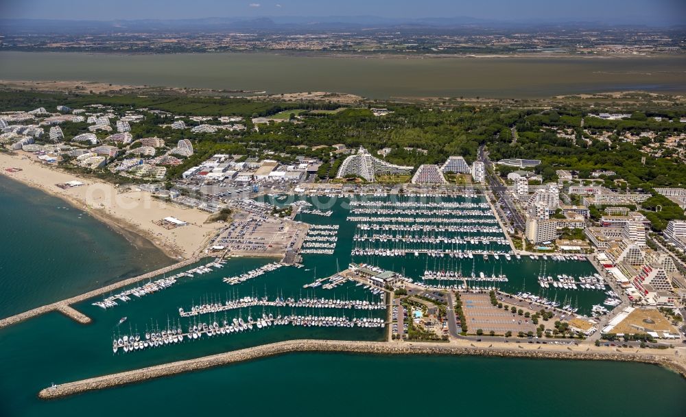 Aerial image La Grande-Motte - Hotel landscape and tourist developments on the Mediterranean beach in La Grande-Motte in the province of Languedoc-Roussillon in France