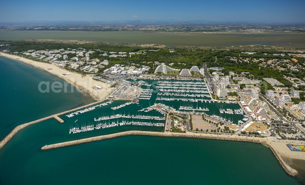 La Grande-Motte from above - Hotel landscape and tourist developments on the Mediterranean beach in La Grande-Motte in the province of Languedoc-Roussillon in France