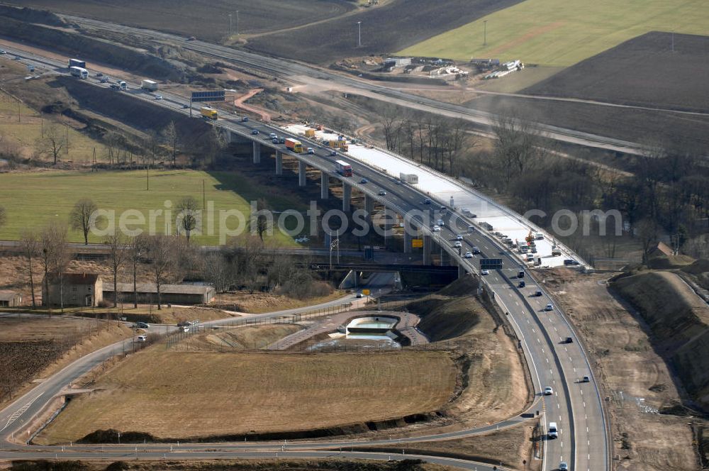 Sättelstädt from the bird's eye view: Blick auf die neue Hörseltalbrücke nach der teilweisen Verkehrsfreigabe des neuen A4- Autobahnverlaufes. Die Brücke ist Teil des Projekt Nordverlegung / Umfahrung Hörselberge der Autobahn E40 / A4 in Thüringen bei Eisenach. Durchgeführt werden die im Zuge dieses Projektes notwendigen Arbeiten unter an derem von den Mitarbeitern der Niederlassung Weimar der EUROVIA Verkehrsbau Union sowie der Niederlassungen Abbruch und Erdbau, Betonstraßenbau, Ingenieurbau und TECO Schallschutz der EUROVIA Beton sowie der DEGES. View at the new Hörselthal- bridge after the partial opening to traffic of the new A4 motorway course.