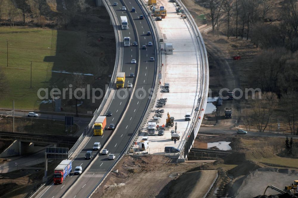 Aerial image Sättelstädt - Blick auf die neue Hörseltalbrücke nach der teilweisen Verkehrsfreigabe des neuen A4- Autobahnverlaufes. Die Brücke ist Teil des Projekt Nordverlegung / Umfahrung Hörselberge der Autobahn E40 / A4 in Thüringen bei Eisenach. Durchgeführt werden die im Zuge dieses Projektes notwendigen Arbeiten unter an derem von den Mitarbeitern der Niederlassung Weimar der EUROVIA Verkehrsbau Union sowie der Niederlassungen Abbruch und Erdbau, Betonstraßenbau, Ingenieurbau und TECO Schallschutz der EUROVIA Beton sowie der DEGES. View at the new Hörselthal- bridge after the partial opening to traffic of the new A4 motorway course.