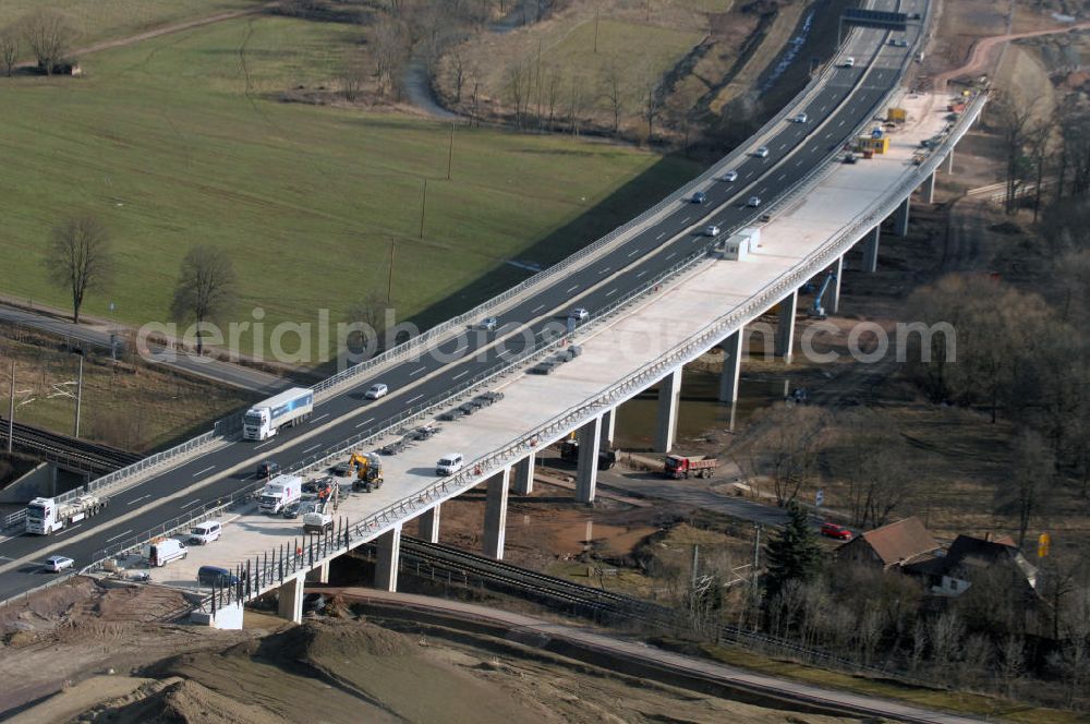 Sättelstädt from the bird's eye view: Blick auf die neue Hörseltalbrücke nach der teilweisen Verkehrsfreigabe des neuen A4- Autobahnverlaufes. Die Brücke ist Teil des Projekt Nordverlegung / Umfahrung Hörselberge der Autobahn E40 / A4 in Thüringen bei Eisenach. Durchgeführt werden die im Zuge dieses Projektes notwendigen Arbeiten unter an derem von den Mitarbeitern der Niederlassung Weimar der EUROVIA Verkehrsbau Union sowie der Niederlassungen Abbruch und Erdbau, Betonstraßenbau, Ingenieurbau und TECO Schallschutz der EUROVIA Beton sowie der DEGES. View at the new Hörselthal- bridge after the partial opening to traffic of the new A4 motorway course.