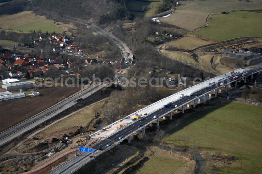 Aerial image Sättelstädt - Blick auf die neue Hörseltalbrücke nach der teilweisen Verkehrsfreigabe des neuen A4- Autobahnverlaufes. Die Brücke ist Teil des Projekt Nordverlegung / Umfahrung Hörselberge der Autobahn E40 / A4 in Thüringen bei Eisenach. Durchgeführt werden die im Zuge dieses Projektes notwendigen Arbeiten unter an derem von den Mitarbeitern der Niederlassung Weimar der EUROVIA Verkehrsbau Union sowie der Niederlassungen Abbruch und Erdbau, Betonstraßenbau, Ingenieurbau und TECO Schallschutz der EUROVIA Beton sowie der DEGES. View at the new Hörselthal- bridge after the partial opening to traffic of the new A4 motorway course.