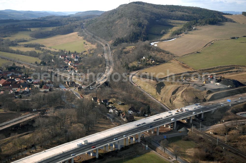 Aerial photograph Sättelstädt - Blick auf die neue Hörseltalbrücke nach der teilweisen Verkehrsfreigabe des neuen A4- Autobahnverlaufes. Die Brücke ist Teil des Projekt Nordverlegung / Umfahrung Hörselberge der Autobahn E40 / A4 in Thüringen bei Eisenach. Durchgeführt werden die im Zuge dieses Projektes notwendigen Arbeiten unter an derem von den Mitarbeitern der Niederlassung Weimar der EUROVIA Verkehrsbau Union sowie der Niederlassungen Abbruch und Erdbau, Betonstraßenbau, Ingenieurbau und TECO Schallschutz der EUROVIA Beton sowie der DEGES. View at the new Hörselthal- bridge after the partial opening to traffic of the new A4 motorway course.