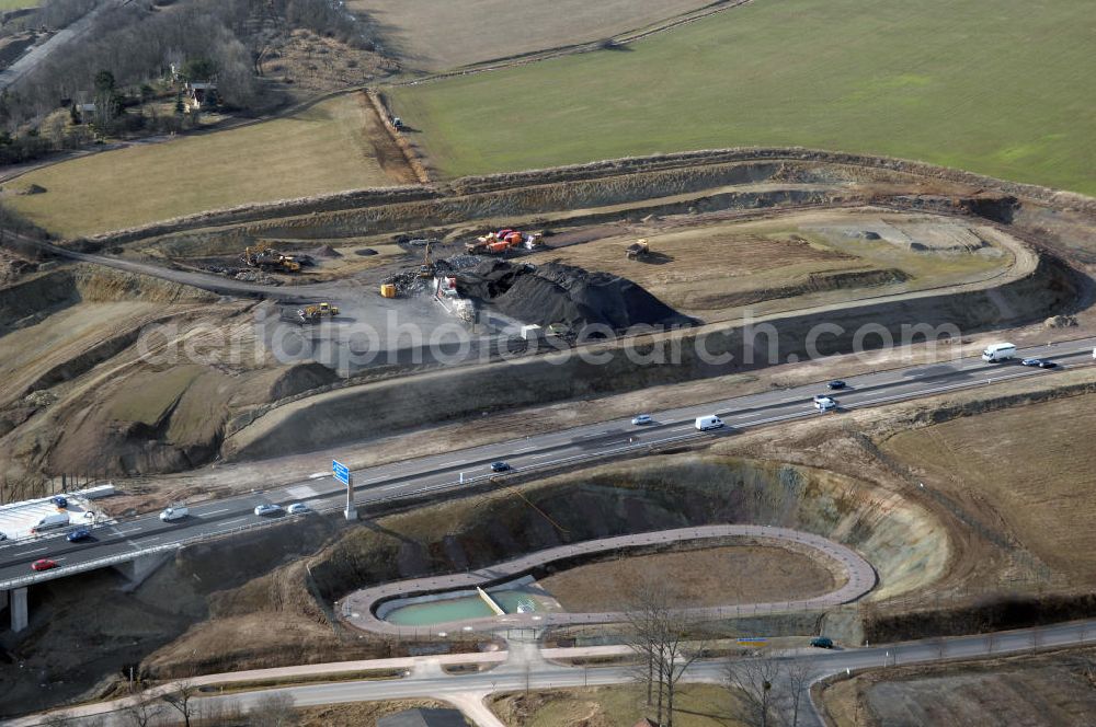 Aerial image Sättelstädt - Blick auf die neue Hörseltalbrücke nach der teilweisen Verkehrsfreigabe des neuen A4- Autobahnverlaufes. Die Brücke ist Teil des Projekt Nordverlegung / Umfahrung Hörselberge der Autobahn E40 / A4 in Thüringen bei Eisenach. Durchgeführt werden die im Zuge dieses Projektes notwendigen Arbeiten unter an derem von den Mitarbeitern der Niederlassung Weimar der EUROVIA Verkehrsbau Union sowie der Niederlassungen Abbruch und Erdbau, Betonstraßenbau, Ingenieurbau und TECO Schallschutz der EUROVIA Beton sowie der DEGES. View at the new Hörselthal- bridge after the partial opening to traffic of the new A4 motorway course.