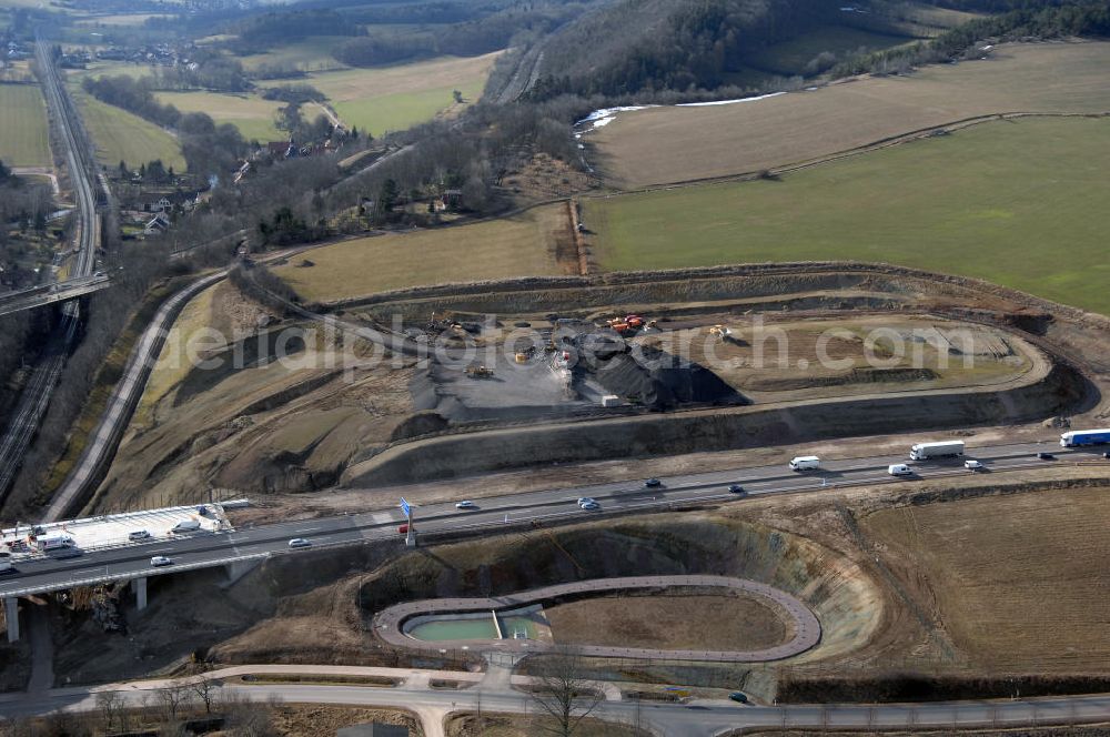 Aerial photograph Sättelstädt - Blick auf die neue Hörseltalbrücke nach der teilweisen Verkehrsfreigabe des neuen A4- Autobahnverlaufes. Die Brücke ist Teil des Projekt Nordverlegung / Umfahrung Hörselberge der Autobahn E40 / A4 in Thüringen bei Eisenach. Durchgeführt werden die im Zuge dieses Projektes notwendigen Arbeiten unter an derem von den Mitarbeitern der Niederlassung Weimar der EUROVIA Verkehrsbau Union sowie der Niederlassungen Abbruch und Erdbau, Betonstraßenbau, Ingenieurbau und TECO Schallschutz der EUROVIA Beton sowie der DEGES. View at the new Hörselthal- bridge after the partial opening to traffic of the new A4 motorway course.