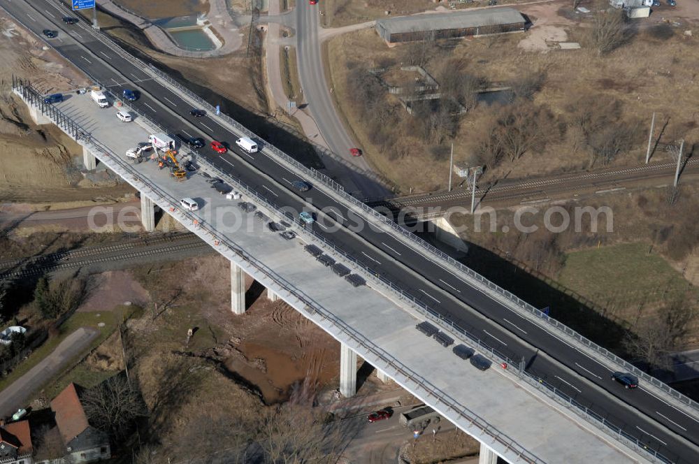 Sättelstädt from the bird's eye view: Blick auf die neue Hörseltalbrücke nach der teilweisen Verkehrsfreigabe des neuen A4- Autobahnverlaufes. Die Brücke ist Teil des Projekt Nordverlegung / Umfahrung Hörselberge der Autobahn E40 / A4 in Thüringen bei Eisenach. Durchgeführt werden die im Zuge dieses Projektes notwendigen Arbeiten unter an derem von den Mitarbeitern der Niederlassung Weimar der EUROVIA Verkehrsbau Union sowie der Niederlassungen Abbruch und Erdbau, Betonstraßenbau, Ingenieurbau und TECO Schallschutz der EUROVIA Beton sowie der DEGES. View at the new Hörselthal- bridge after the partial opening to traffic of the new A4 motorway course.