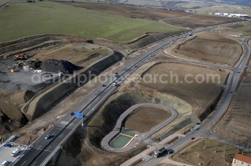 Sättelstädt from above - Blick auf die neue Hörseltalbrücke nach der teilweisen Verkehrsfreigabe des neuen A4- Autobahnverlaufes. Die Brücke ist Teil des Projekt Nordverlegung / Umfahrung Hörselberge der Autobahn E40 / A4 in Thüringen bei Eisenach. Durchgeführt werden die im Zuge dieses Projektes notwendigen Arbeiten unter an derem von den Mitarbeitern der Niederlassung Weimar der EUROVIA Verkehrsbau Union sowie der Niederlassungen Abbruch und Erdbau, Betonstraßenbau, Ingenieurbau und TECO Schallschutz der EUROVIA Beton sowie der DEGES. View at the new Hörselthal- bridge after the partial opening to traffic of the new A4 motorway course.