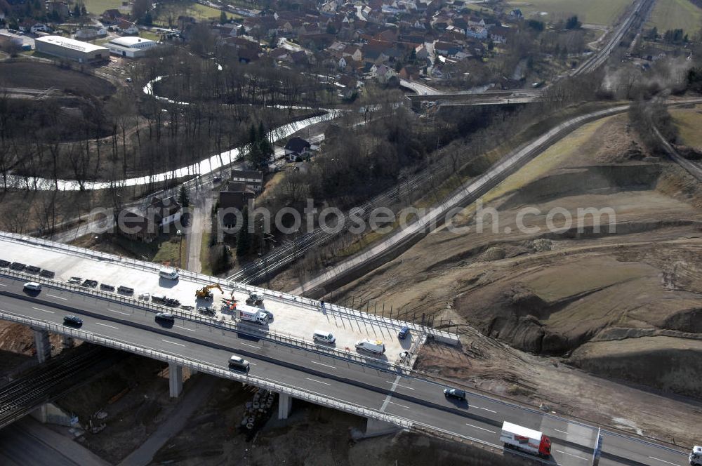 Sättelstädt from the bird's eye view: Blick auf die neue Hörseltalbrücke nach der teilweisen Verkehrsfreigabe des neuen A4- Autobahnverlaufes. Die Brücke ist Teil des Projekt Nordverlegung / Umfahrung Hörselberge der Autobahn E40 / A4 in Thüringen bei Eisenach. Durchgeführt werden die im Zuge dieses Projektes notwendigen Arbeiten unter an derem von den Mitarbeitern der Niederlassung Weimar der EUROVIA Verkehrsbau Union sowie der Niederlassungen Abbruch und Erdbau, Betonstraßenbau, Ingenieurbau und TECO Schallschutz der EUROVIA Beton sowie der DEGES. View at the new Hörselthal- bridge after the partial opening to traffic of the new A4 motorway course.