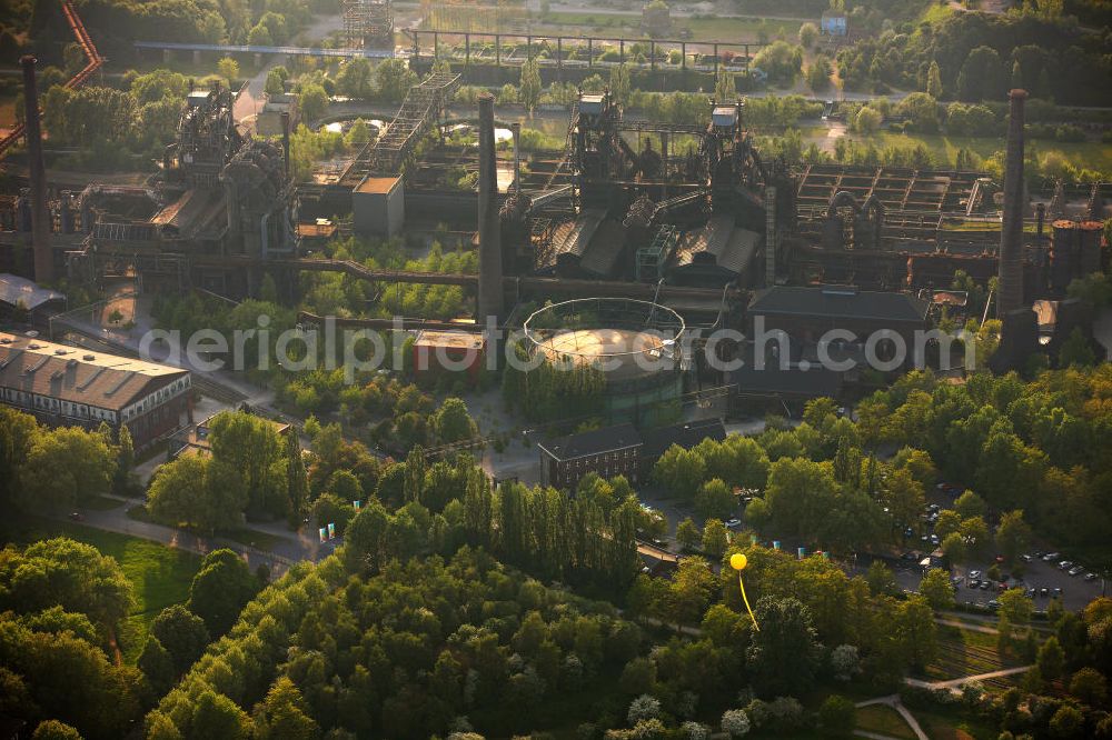 Duisburg from the bird's eye view: Das stillgelegte Hüttenwerk im Landschaftspark Duisburg-Nord an den Straßen Am Schürmannshof, Emscherstraße und Emscherschnellweg in Duisburg in Nordrhein-Westfalen. The mill / smelting works in the landscape garden Duisburg-Nord at the streets Am Schürmannshof, Emscherstrasse und Emscherschnellweg in Duisburg in North Rhine-Westphalia.