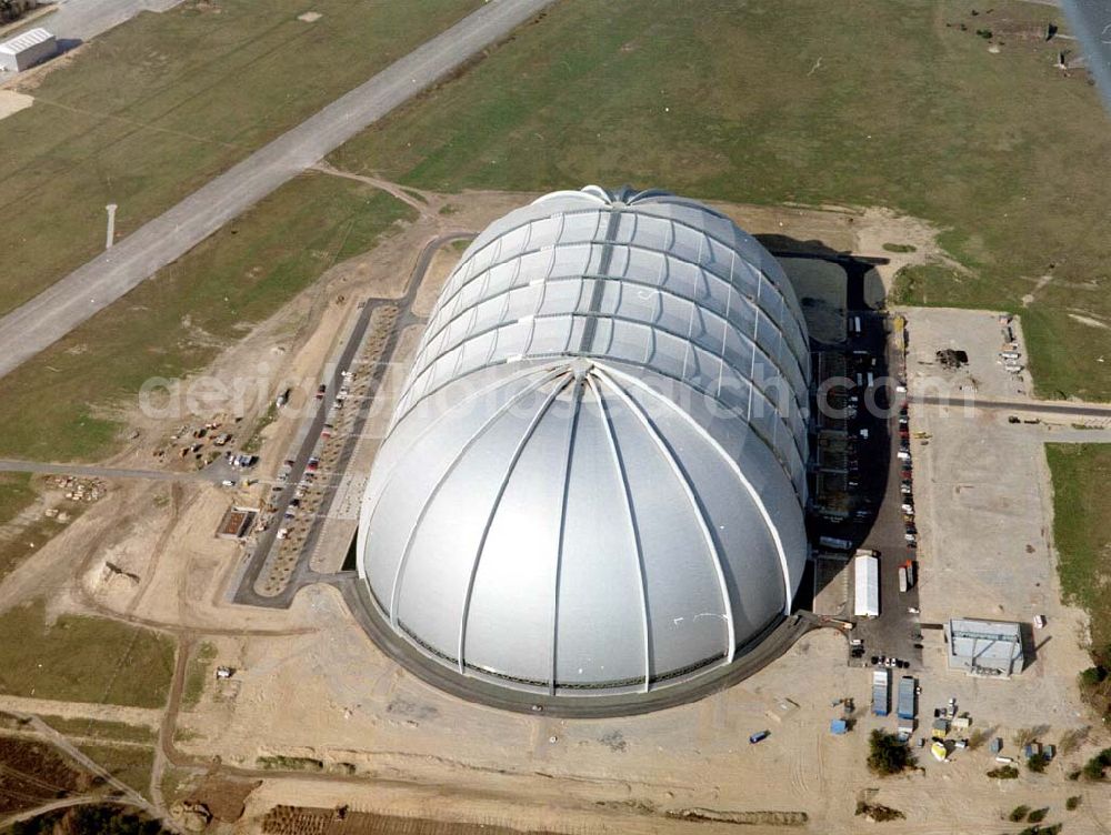 Aerial image Krausnik - Die größte frei tragende Halle der Welt bietet genug Platz für ein Tropenparadies. In den kommenden Monaten findet die Verwandlung vom Cargolifter Hangar, der ehemaligen Produktionsstätte für Transportluftschiffe, zum Tropical Islands Dome mit seinem einzigartigen Attraktionen statt. Tropical Island Management GmbH,Tropical-Islands-Allee 1,15910 Krausnick – Gross Wasserburg,Tel: +49-35477-60-100,Fax: +49-35477-60-3129 ,http://