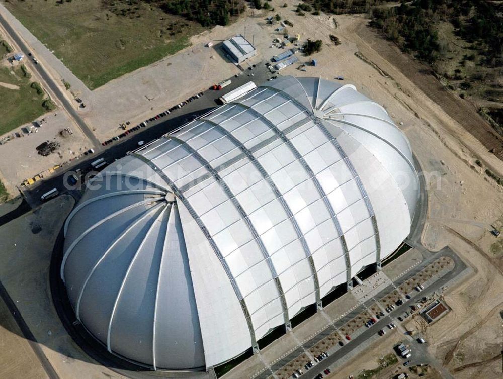 Aerial image Krausnik - Die größte frei tragende Halle der Welt bietet genug Platz für ein Tropenparadies. In den kommenden Monaten findet die Verwandlung vom Cargolifter Hangar, der ehemaligen Produktionsstätte für Transportluftschiffe, zum Tropical Islands Dome mit seinem einzigartigen Attraktionen statt. Tropical Island Management GmbH,Tropical-Islands-Allee 1,15910 Krausnick – Gross Wasserburg,Tel: +49-35477-60-100,Fax: +49-35477-60-3129 ,http://