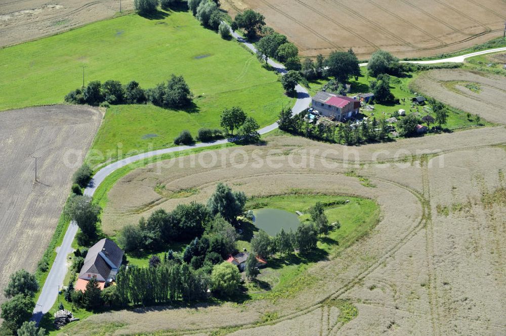 Blankenhagen from the bird's eye view: Häuser an der Straße Siedlungsweg Ausbau bei Blankenhagen, Mecklenburg-Vorpommern. Houses at the street Siedlungsweg Ausbau in Blankenhagen, Mecklenburg-Western Pomerania.