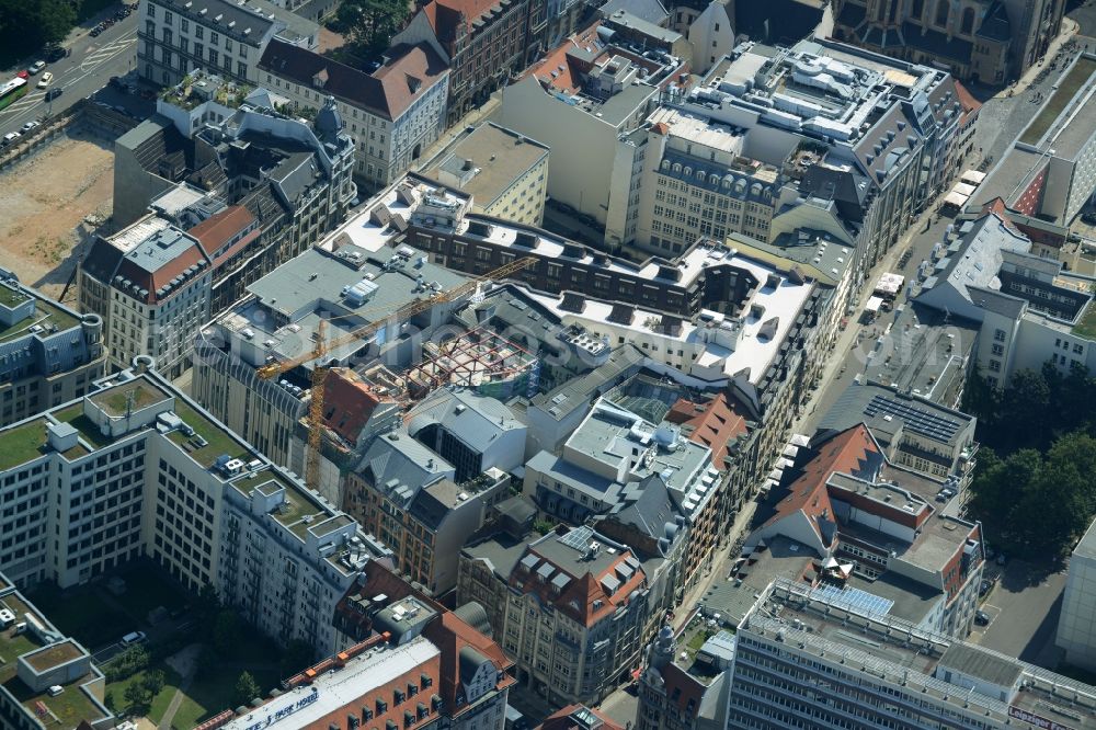 Leipzig from the bird's eye view: Block of buildings on the corner of the streets Bruehl and Nikolaistrasse in the city centre of Leipzig in the state of Saxony. The block consists of historic and modern buildings. Construction works are taking place as well