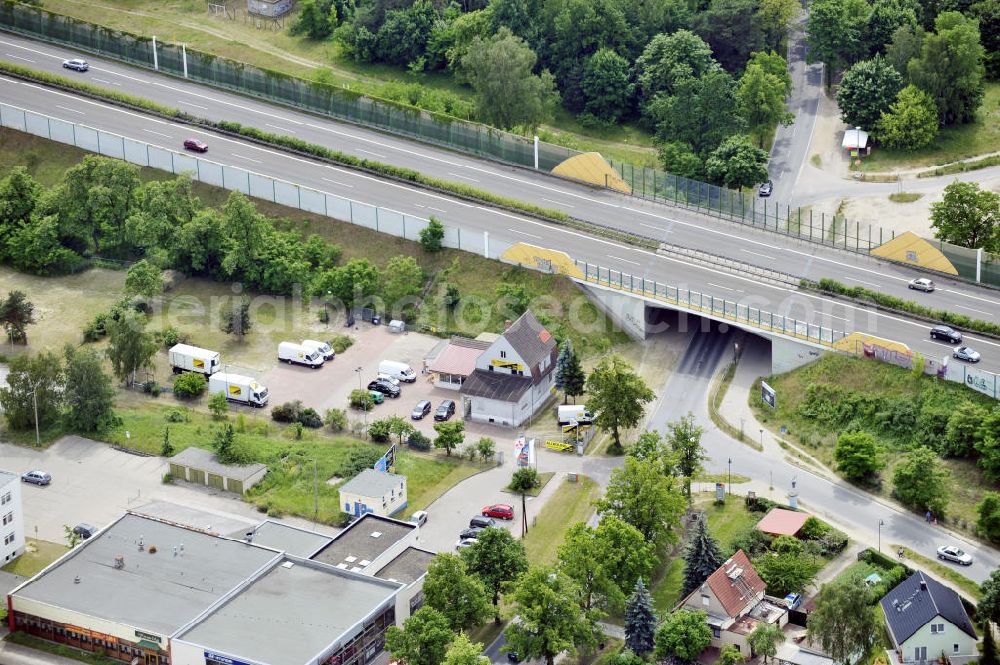 Bernau from the bird's eye view: Blick über das Hyundai-Autohaus, das China-Restaurant Family und die Allround-Autovermietung auf die Autobahnbrücke der A11 über die Zepernicker Chaussee. View above the Hyundai Car-Center, the China-Restaurant Family and the Allround Car-Rental to the motorway bridge about the Zepernicker Chaussee.