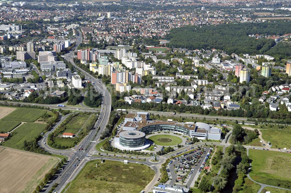 Rüsselsheim from the bird's eye view: Hyndai Motor Europe Technical Center GmbH im Gewerbepark / Business Park Blauer See am Verkehrsknotenpunkt Rüsselsheimer Dreieck im Rhein-Main-Gebiet. Das Büro- und Dienstleistungszentrum ist ein Projekt der HVB Immobilien AG. The industrial park Blauer See in the Rhine-Main region.