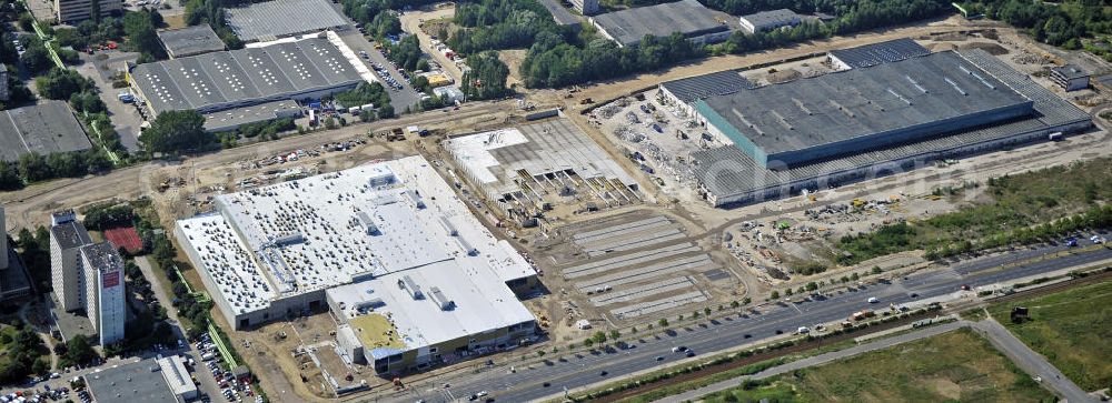 Aerial photograph Berlin - Blick auf die IKEA Baustelle in Berlin Lichtenberg. Bis zum November diesen Jahres entsteht hier an der Landsberger Allee der zweitgrößte Ikea-Standort in Europa mit 22 000 Quadratmetern und zugleich das dritte Berliner Einrichtungshaus. Eröffnung soll Anfang November 2010 sein. View of the IKEA construction area in Berlin Lichtenberg. It is the third furniture store in Berlin.