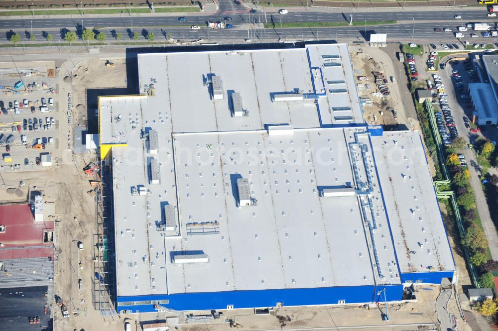 Aerial photograph Berlin - Blick auf die IKEA Baustelle in Berlin Lichtenberg. Bis zum November diesen Jahres entsteht hier an der Landsberger Allee der zweitgrößte Ikea-Standort in Europa mit 22 000 Quadratmetern und zugleich das dritte Berliner Einrichtungshaus. Eröffnung soll Anfang November 2010 sein. View of the IKEA construction area in Berlin Lichtenberg. It is the third furniture store in Berlin.