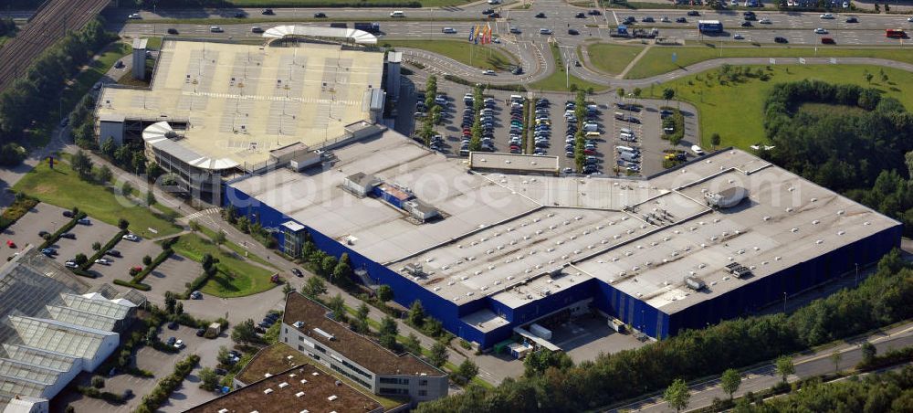 Aerial photograph Bielefeld - Die Filiale des schwedischen Einrichtungshauses Ikea in Bielefeld, Nordrhein-Westfalen. Das Möbelhaus ist mit einem Parkhaus kombiniert. Branch of the sweedish furnishing house Ikea in Bielefeld, North Rhine-Westphalia. The furniture shop is combined with a parking ramp.