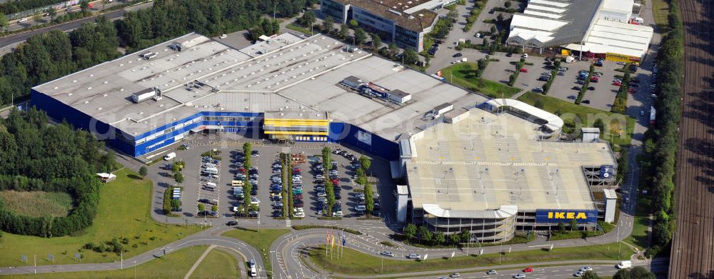 Aerial photograph Bielefeld - Die Filiale des schwedischen Einrichtungshauses Ikea in Bielefeld, Nordrhein-Westfalen. Das Möbelhaus ist mit einem Parkhaus kombiniert. Branch of the sweedish furnishing house Ikea in Bielefeld, North Rhine-Westphalia. The furniture shop is combined with a parking ramp.