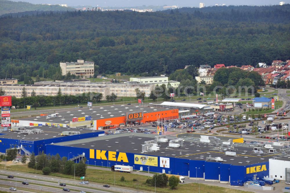 Aerial image Danzig / Gdansk - Blick auf das Gewerbegebiet mit dem IKEA Einrichtungshaus, Baumarkt OBI an der Schnellstraße E28 Aleja-Kazimierza-Jagiellouczyka in Danzig in Polen. View over trading estate with furnishing house IKEA, DIY market OBI etc. at highway E28 Aleja-Kazimierza-Jagiellouczyka in Gdansk in Poland.