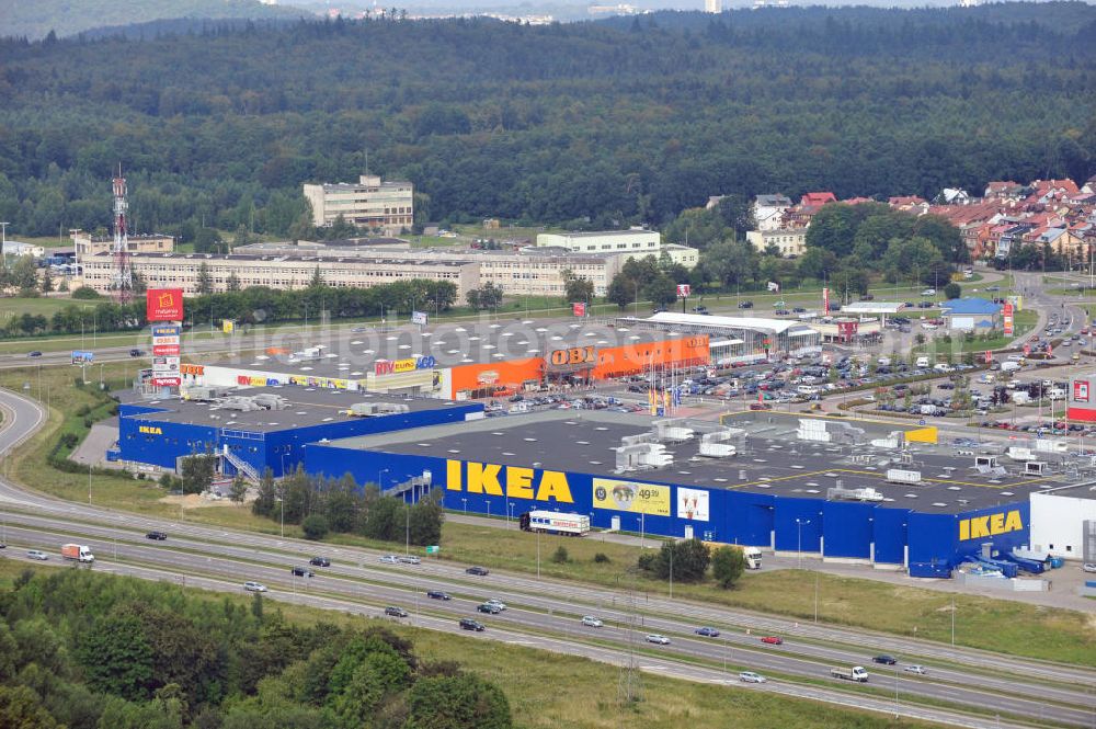 Aerial photograph Danzig / Gdansk - Blick auf das Gewerbegebiet mit dem IKEA Einrichtungshaus, Baumarkt OBI an der Schnellstraße E28 Aleja-Kazimierza-Jagiellouczyka in Danzig in Polen. View over trading estate with furnishing house IKEA, DIY market OBI etc. at highway E28 Aleja-Kazimierza-Jagiellouczyka in Gdansk in Poland.