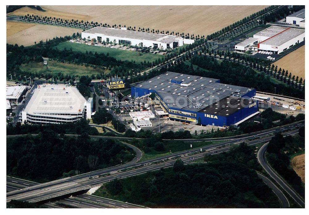 Aerial image Kassel / Hessen - IKEA-Einrichtungshaus Kassel an der Bundesautobahn A49/ Konrad-Zuse Straße/ Heinrich-Herz Straße. Mit im Bild das neu errrichtete Parkdeck sowie der an die OPEL-Niederlassung Kassel vermiete Grundbesitz