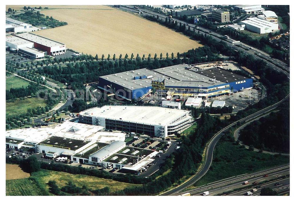 Kassel / Hessen from the bird's eye view: IKEA-Einrichtungshaus Kassel an der Bundesautobahn A49/ Konrad-Zuse Straße/ Heinrich-Herz Straße. Mit im Bild das neu errrichtete Parkdeck sowie der an die OPEL-Niederlassung Kassel vermiete Grundbesitz