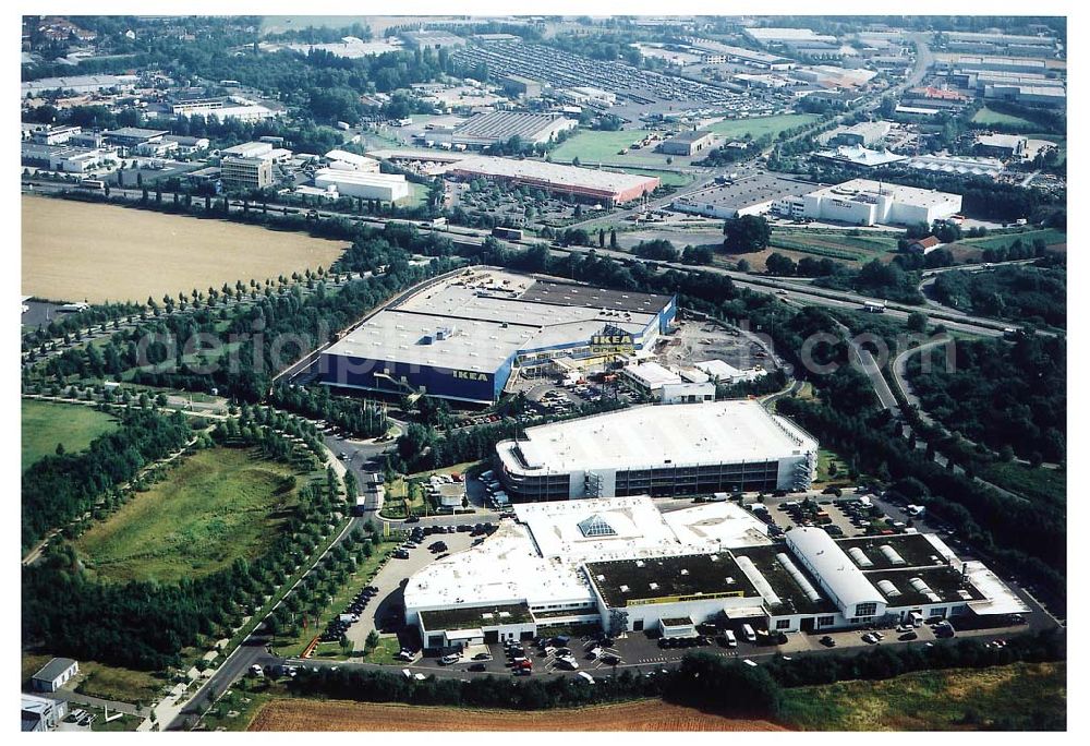 Aerial photograph Kassel / Hessen - IKEA-Einrichtungshaus Kassel an der Bundesautobahn A49/ Konrad-Zuse Straße/ Heinrich-Herz Straße. Mit im Bild das neu errrichtete Parkdeck sowie der an die OPEL-Niederlassung Kassel vermiete Grundbesitz