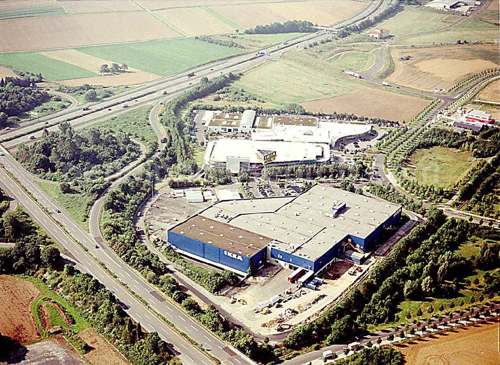 Kassel / Hessen from the bird's eye view: IKEA-Einrichtungshaus Kassel an der Bundesautobahn A49/ Konrad-Zuse Straße/ Heinrich-Herz Straße. Mit im Bild das neu errrichtete Parkdeck sowie der an die OPEL-Niederlassung Kassel vermiete Grundbesitz