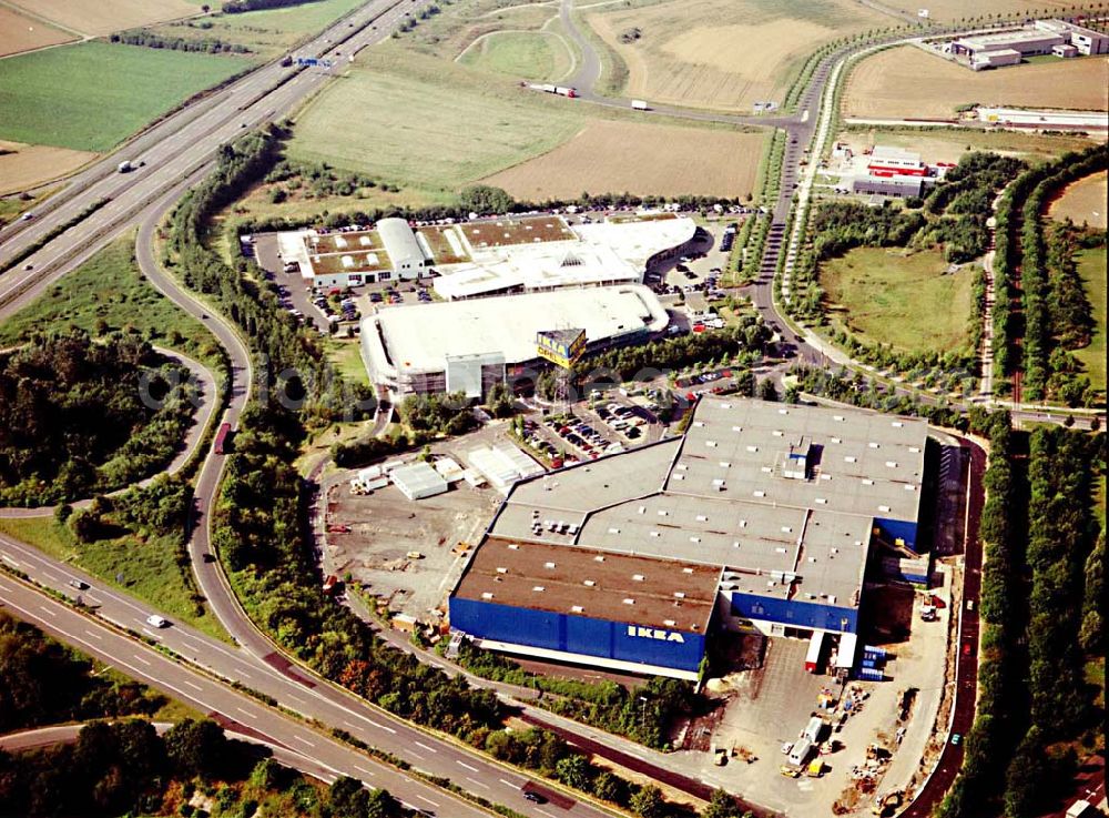 Aerial image Kassel / Hessen - IKEA-Einrichtungshaus Kassel an der Bundesautobahn A49/ Konrad-Zuse Straße/ Heinrich-Herz Straße. Mit im Bild das neu errrichtete Parkdeck sowie der an die OPEL-Niederlassung Kasselvermiete Grundbesitz