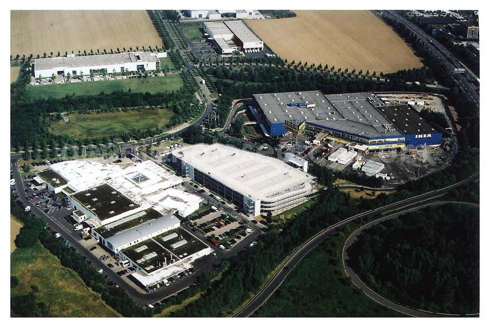 Kassel / Hessen from the bird's eye view: IKEA-Einrichtungshaus Kassel an der Bundesautobahn A49/ Konrad-Zuse Straße/ Heinrich-Herz Straße. Mit im Bild das neu errrichtete Parkdeck sowie der an die OPEL-Niederlassung Kasselvermiete Grundbesitz