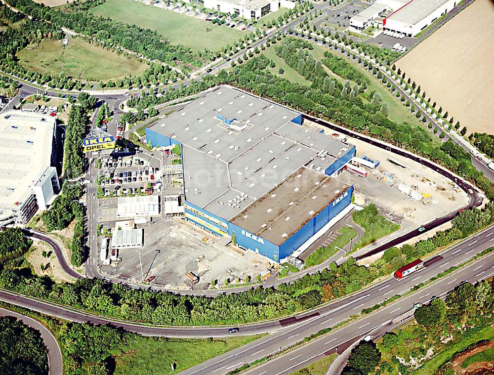 Aerial image Kassel / Hessen - IKEA-Einrichtungshaus Kassel an der Bundesautobahn A49/ Konrad-Zuse Straße/ Heinrich-Herz Straße. Mit im Bild das neu errrichtete Parkdeck sowie der an die OPEL-Niederlassung Kassel vermiete Grundbesitz