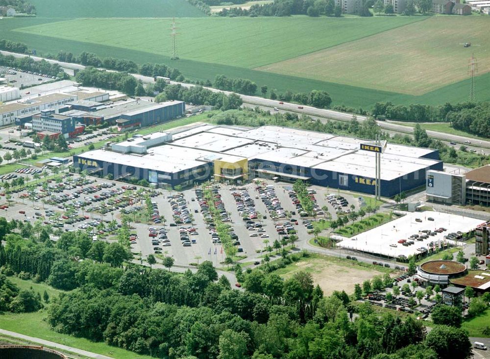 Köln - Godorf from the bird's eye view: IKEA-Einrichtungshaus Köln-Godorf an der Shell-Raffinerie mit dem IKEA-eigenen Gewerbegebiet an der BAB 555.