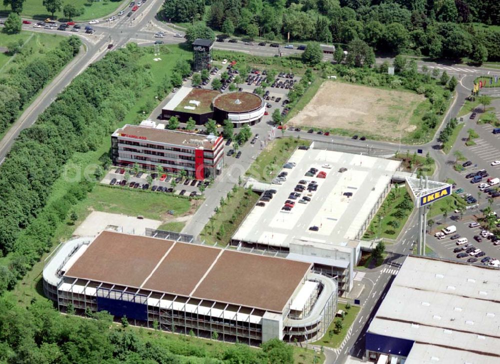 Köln - Godorf from the bird's eye view: IKEA-Einrichtungshaus Köln-Godorf an der Shell-Raffinerie mit dem IKEA-eigenen Gewerbegebiet an der BAB 555.